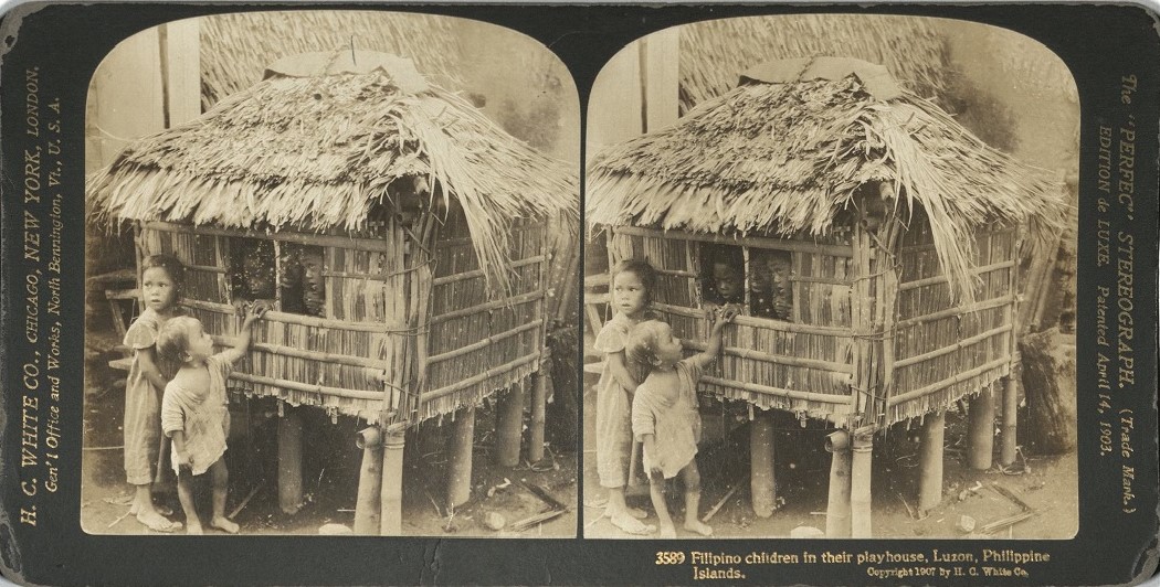 Filipino children in their playhouse, Luzon, Philippine Islands.